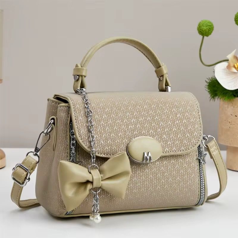 Sac à main avec bandoulière simple et fermeture à glissière