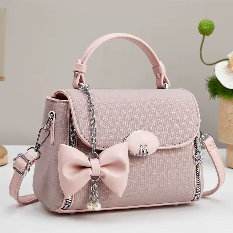 Sac à main avec bandoulière simple et fermeture à glissière